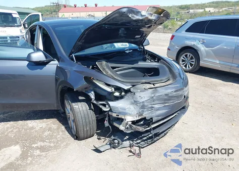 2023 Tesla Model Y Awd/Long Range Dual Motor All-Wheel Drive z USA, uszkodzony, nr VIN 7SAYGDEE8PA191415